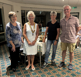 A group of people posing for a photo  Description automatically generated